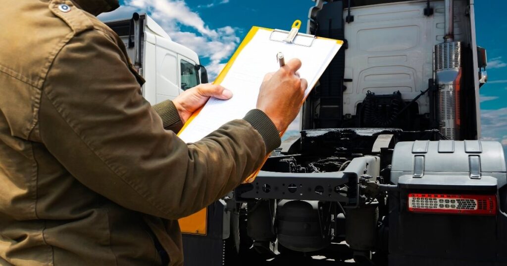 Border agent updating paperwork on a clipboard