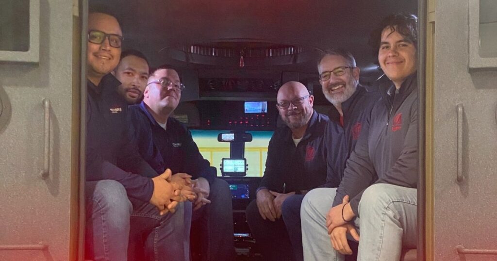 Personnel from Chief Logistics and Chief Carriers seated inside the BearCats vehicle